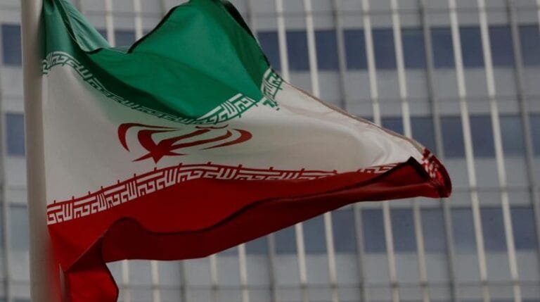 an_iranian_flag_flutters_in_front_of_the_international_atomic_energy_agency_iaea_headquarters_in_vienna_austria_september_9_2019._reuters.jpg